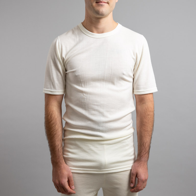Male wearing White SP121 Merino Skins – Unisex Short Sleeve Crew Neck