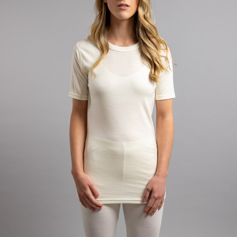 Lady wearing White SP121 Merino Skins – Unisex Short Sleeve Crew Neck