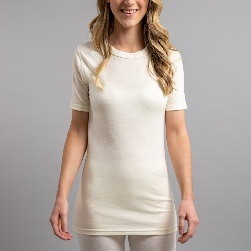 Lady wearing White SP121 Merino Skins – Unisex Short Sleeve Crew Neck