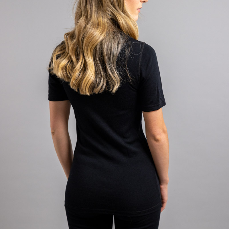 Lady wearing SP121B Merino Skins – Unisex Short Sleeve Crew Neck – Black