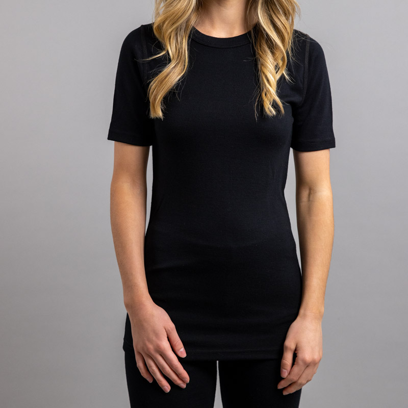 Lady wearing SP121B Merino Skins – Unisex Short Sleeve Crew Neck – Black
