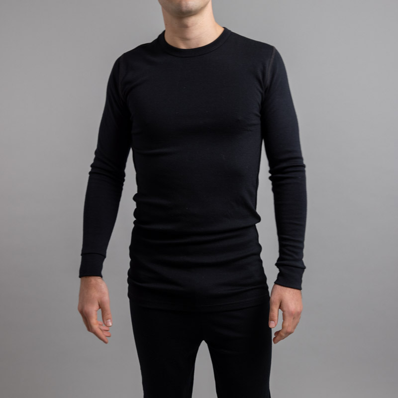 Male wearing Black SP191B Merino Skins – Unisex Long Sleeve Crew Neck