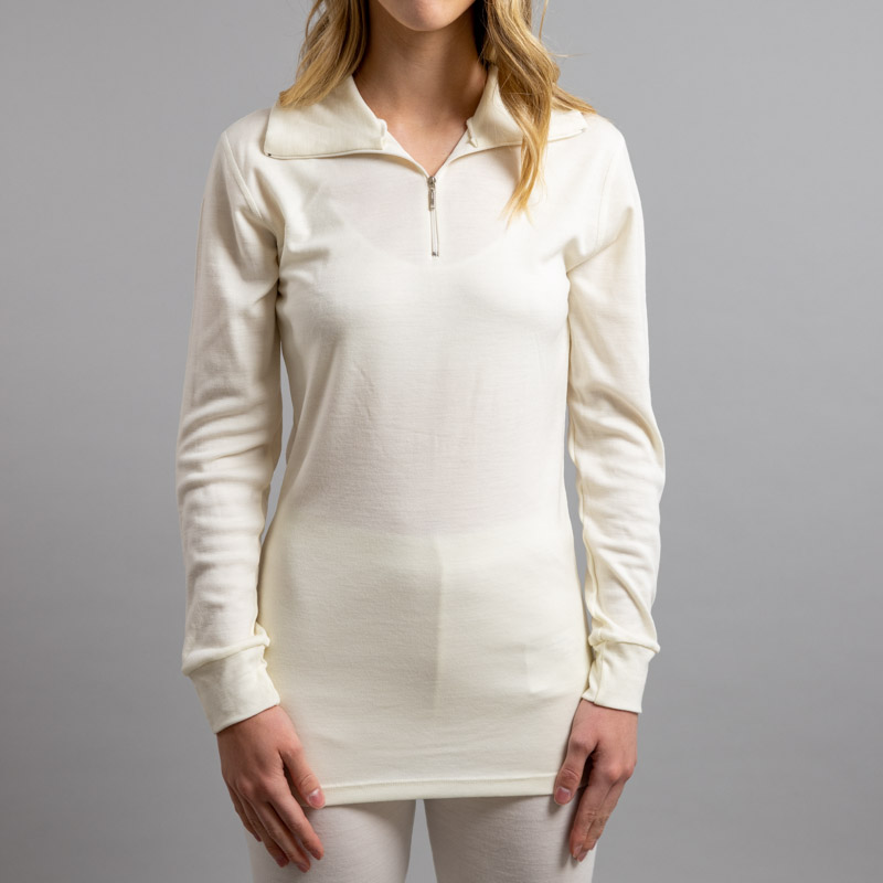 Lady wearing White SPZ Merino Skins – Unisex Long Sleeve Half Zip Front
