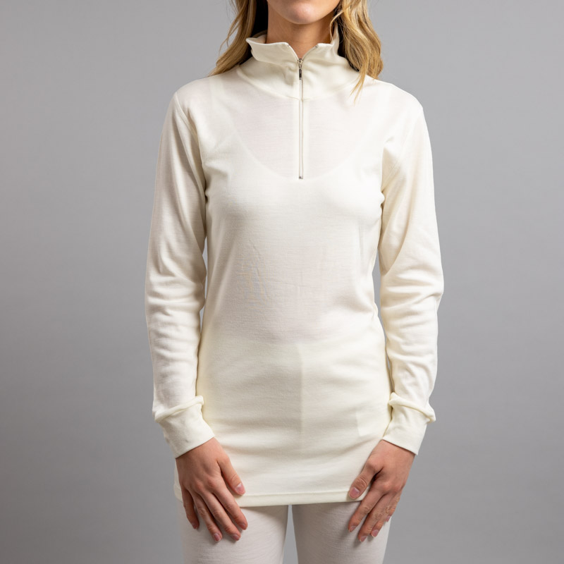 Lady wearing White SPZ Merino Skins – Unisex Long Sleeve Half Zip Front