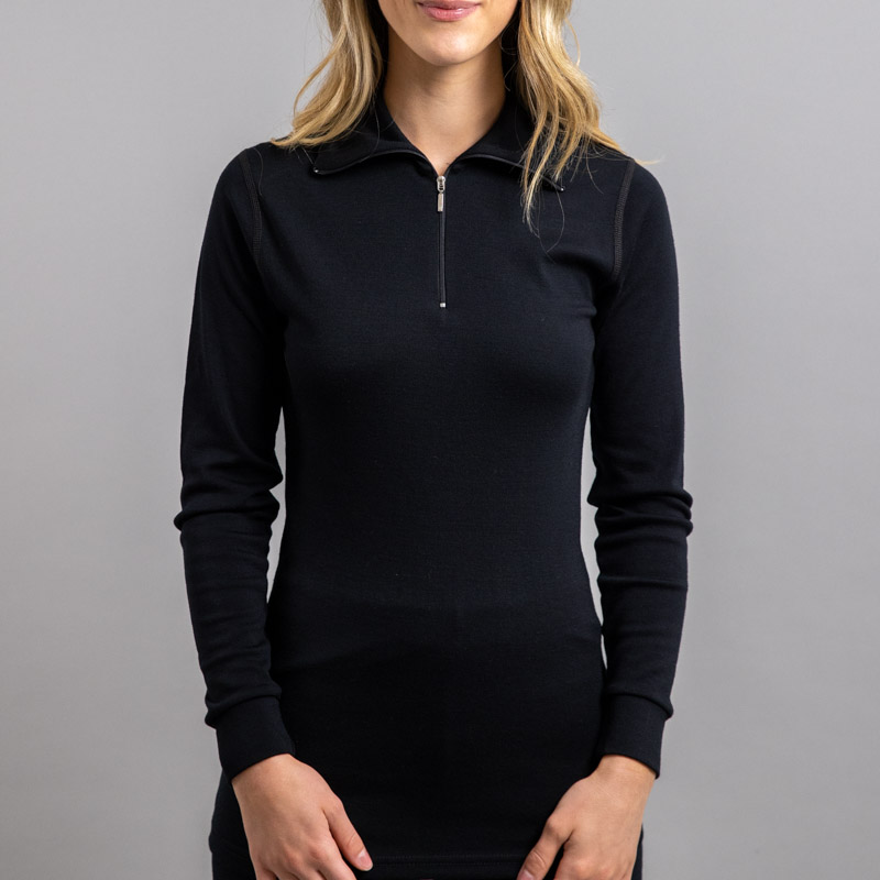 Lady wearing Black SPZB Merino Skins – Unisex Long Sleeve Half Zip Front