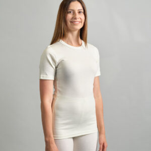 front view of a lady wearing white Merino Skins unisex short sleeve crew neck